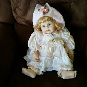 Vintage 20 inch sitting porcelain doll